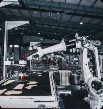 Photograph of machine arm equipment in a state-of-the-art factory